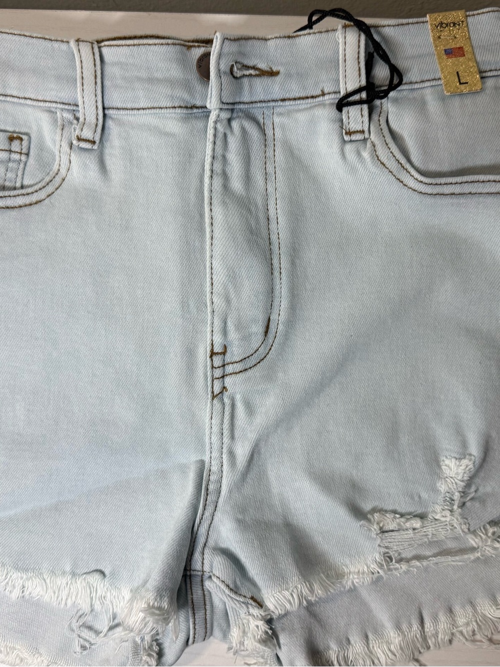 Vibrant Light Blue Distressed Women's Denim Shorts